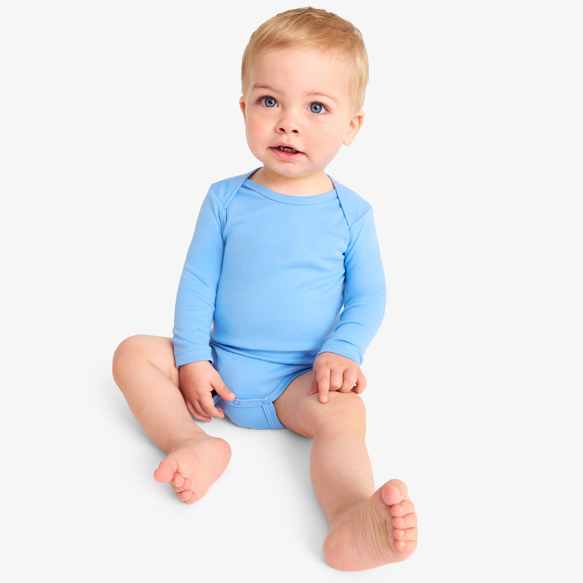 Organic long sleeve babysuit in solids