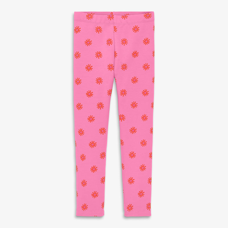 Kids legging in dandelions