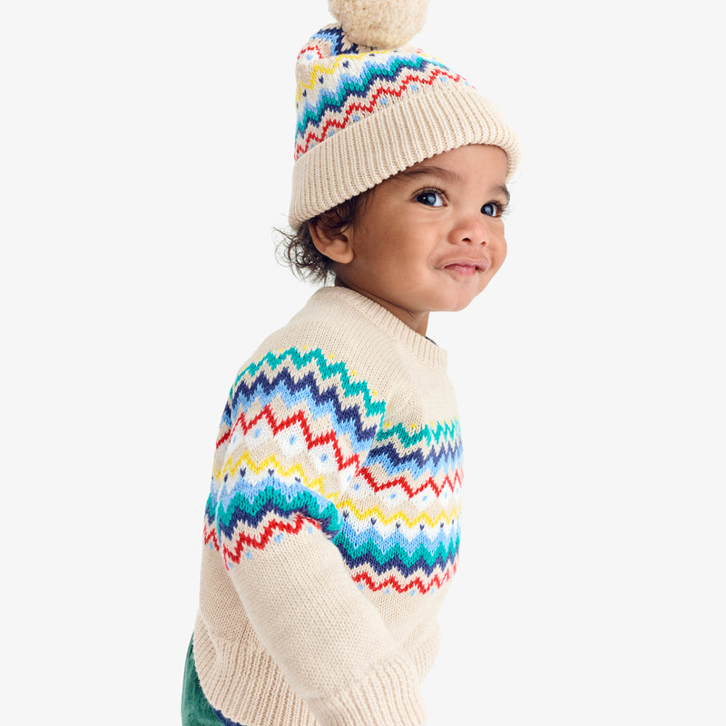 Baby sweater in rainbow fair isle